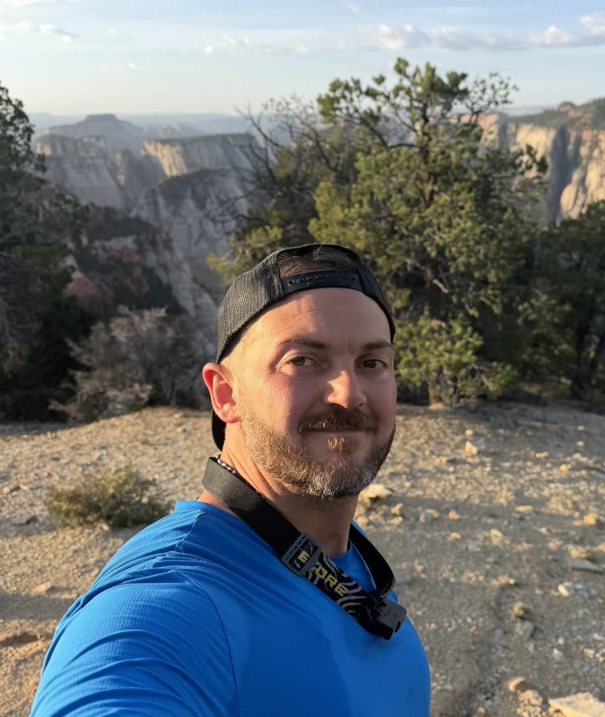 Nate Breedlove, founder of The Extraordinary Adventurer, at a canyon overlook
